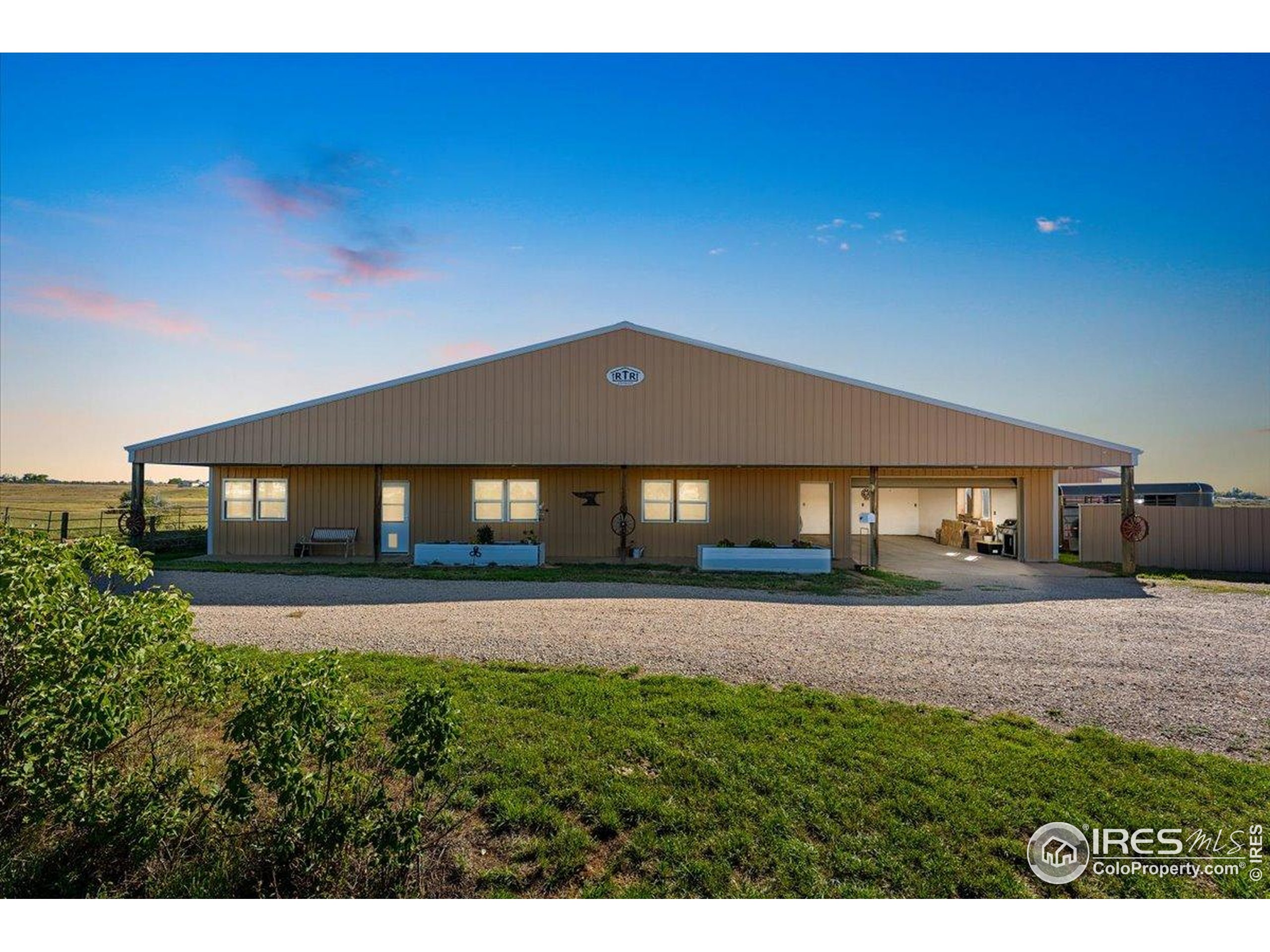 1721 West Co Road 68 Fort Collins, CO 80524 - Photo 14 of 50 a view of a big house with a big yard