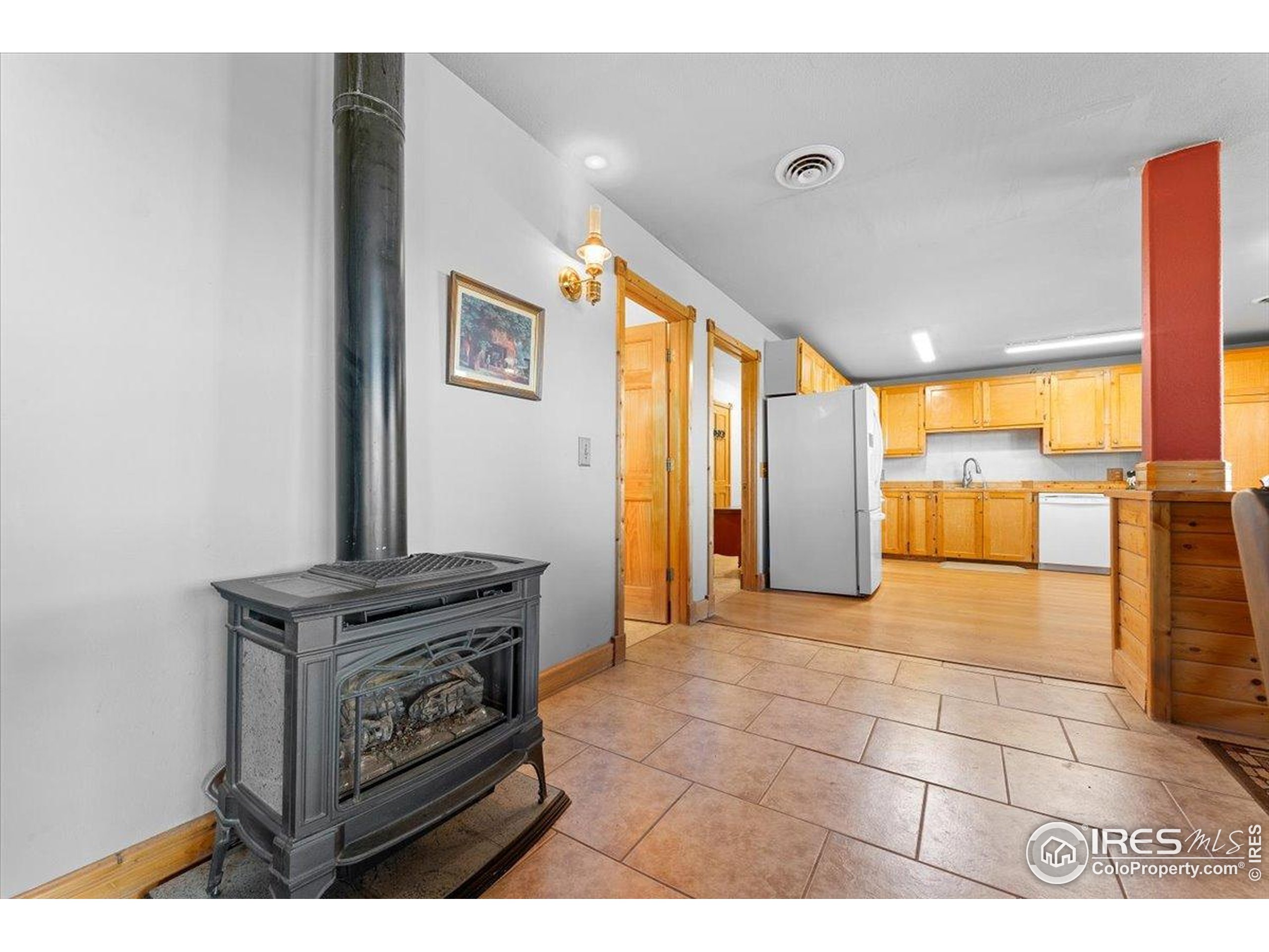 1721 West Co Road 68 Fort Collins, CO 80524 - Photo 18 of 50 a view of kitchen with furniture and large windows