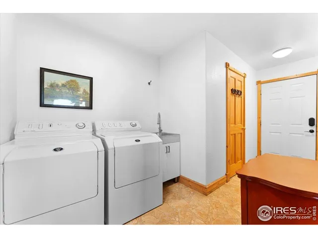 a view of bathroom with dual sinks