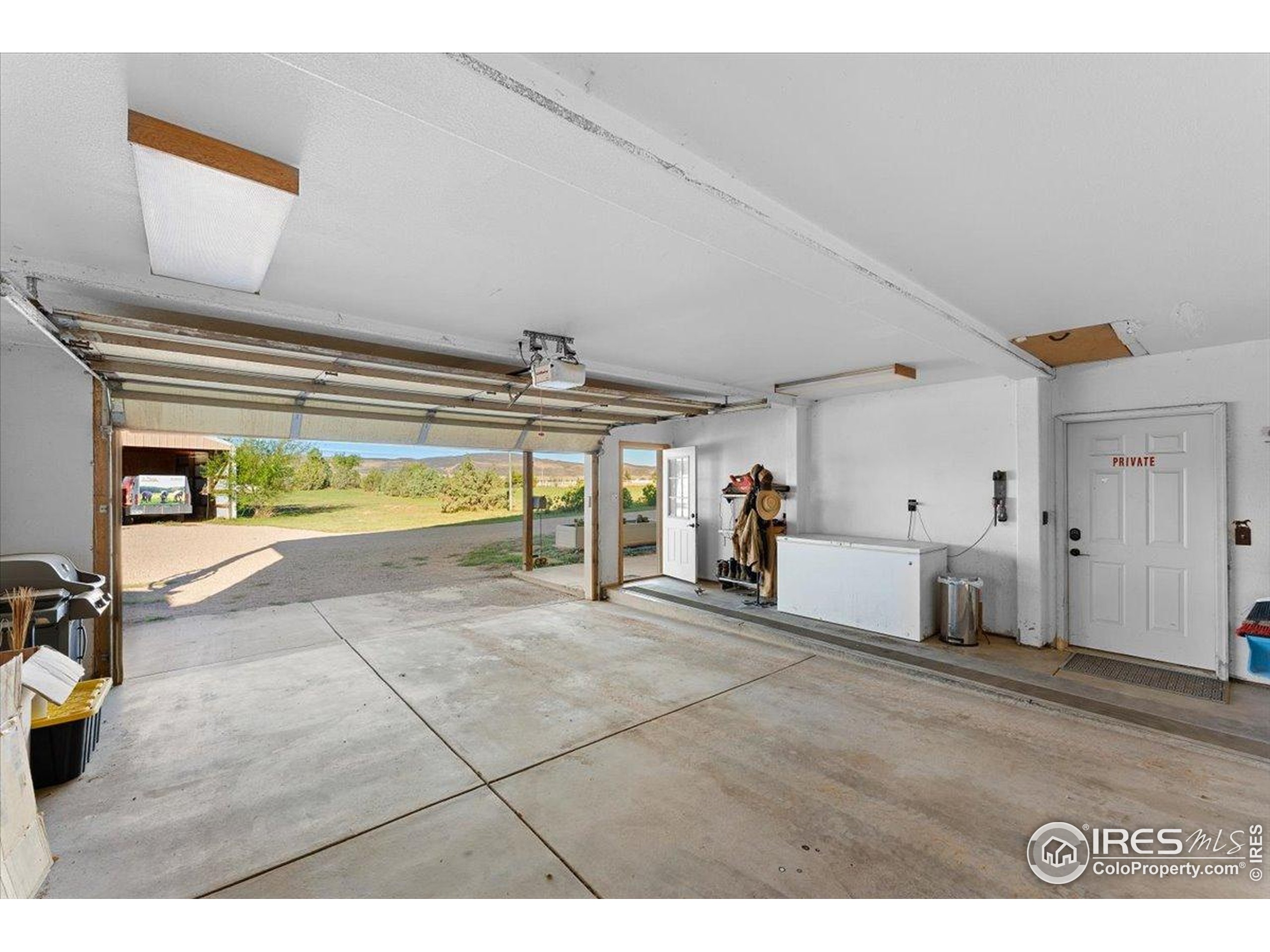 1721 West Co Road 68 Fort Collins, CO 80524 - Photo 25 of 50 a view of a livingroom with furniture and a hallway