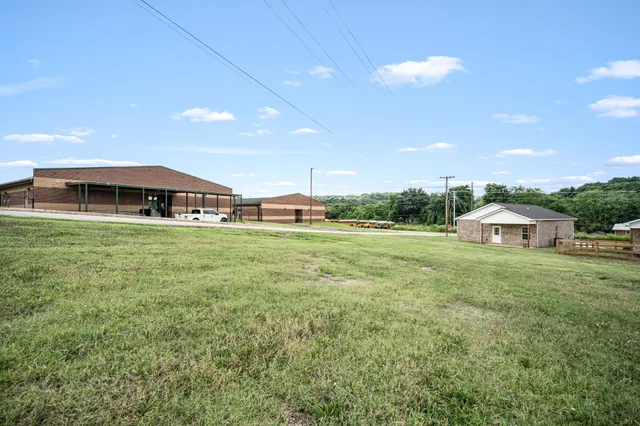 a house view with a garden space