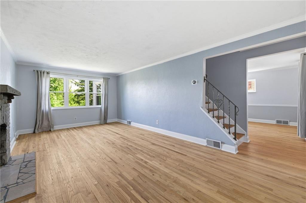 4883 East Willock Road Pittsburgh, PA 15227 - Photo 15 of 33 a view of an empty room with wooden floor and a window