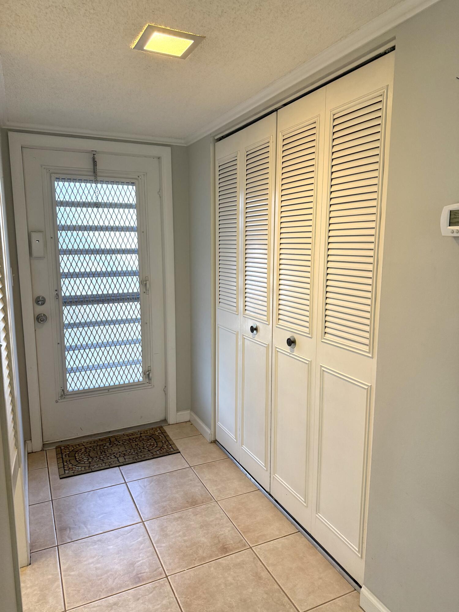 9272 Southwest 3rd Street, Unit 407 Boca Raton, FL 33428 - Photo 3 of 51 Entry Hallway 2