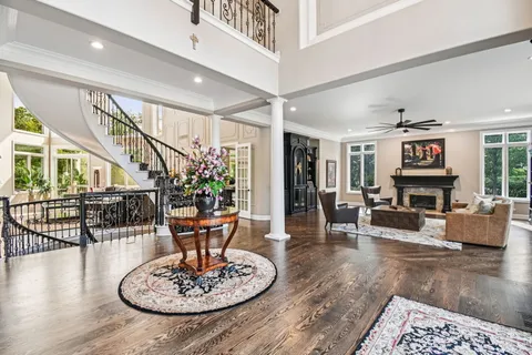 a living room with furniture and a table