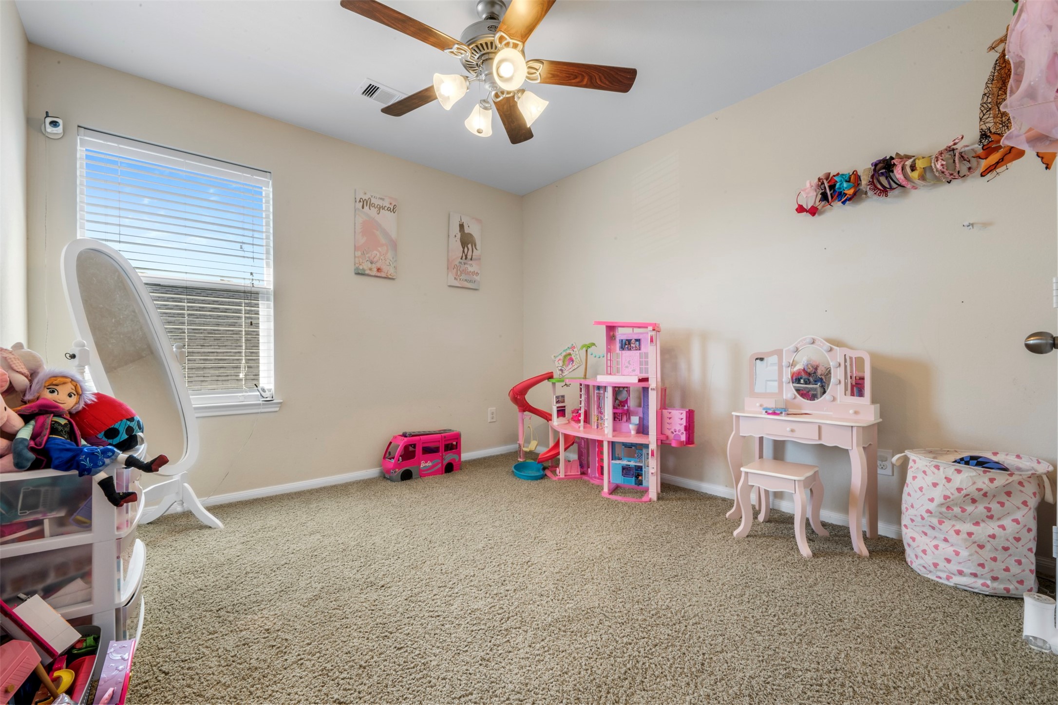 314 Gulf Winds Drive Bacliff, TX 77518 - Photo 16 of 24 a bedroom with furniture and a chandelier