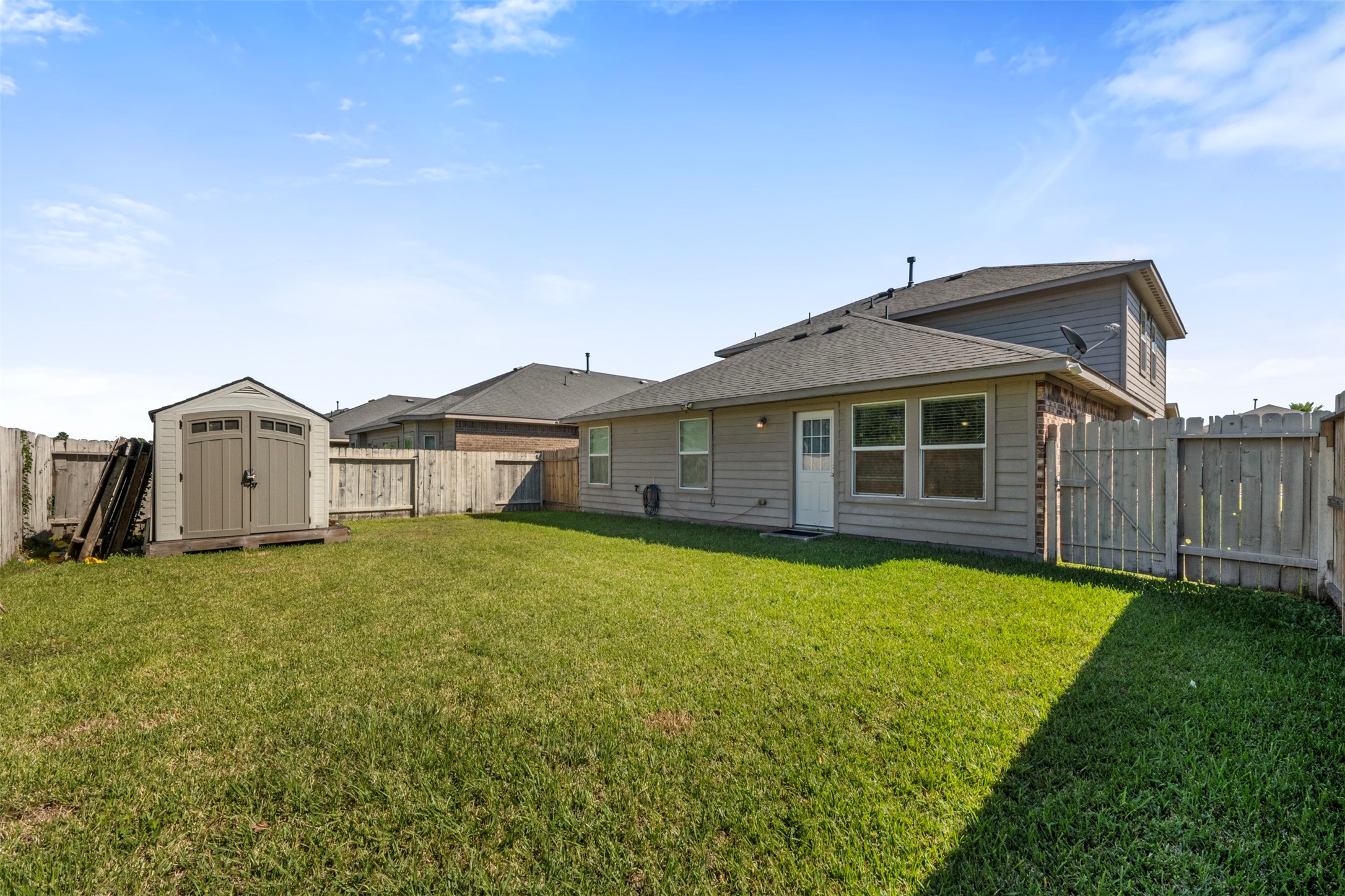 314 Gulf Winds Drive Bacliff, TX 77518 - Photo 18 of 24 a front view of a house with yard