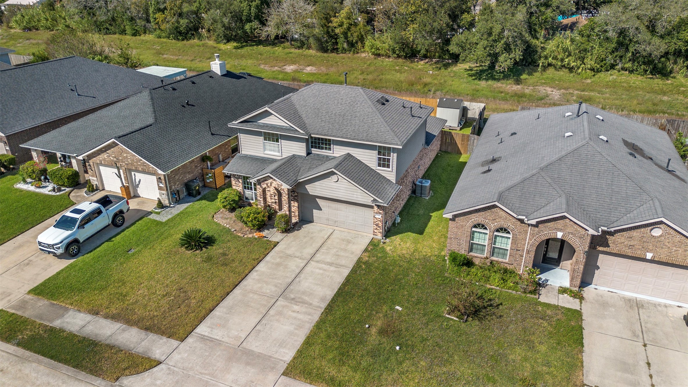 314 Gulf Winds Drive Bacliff, TX 77518 - Photo 20 of 24 an aerial view of a house with a garden and lake view