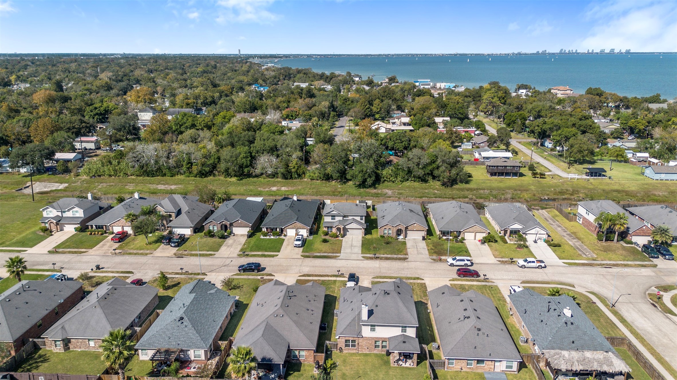 314 Gulf Winds Drive Bacliff, TX 77518 - Photo 22 of 24 an aerial view of a city with lots of residential buildings