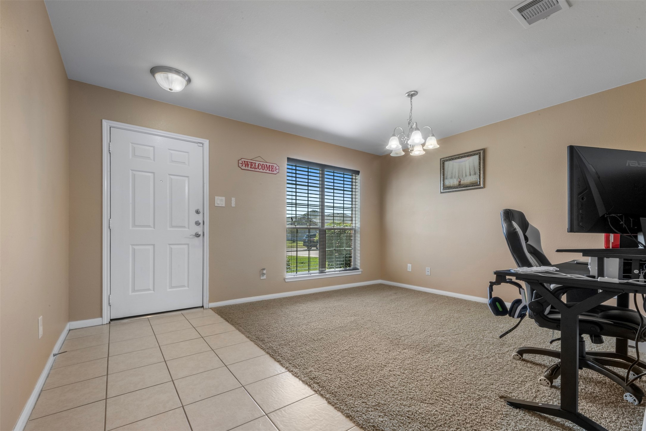 314 Gulf Winds Drive Bacliff, TX 77518 - Photo 3 of 24 a view of a workspace with furniture and a window