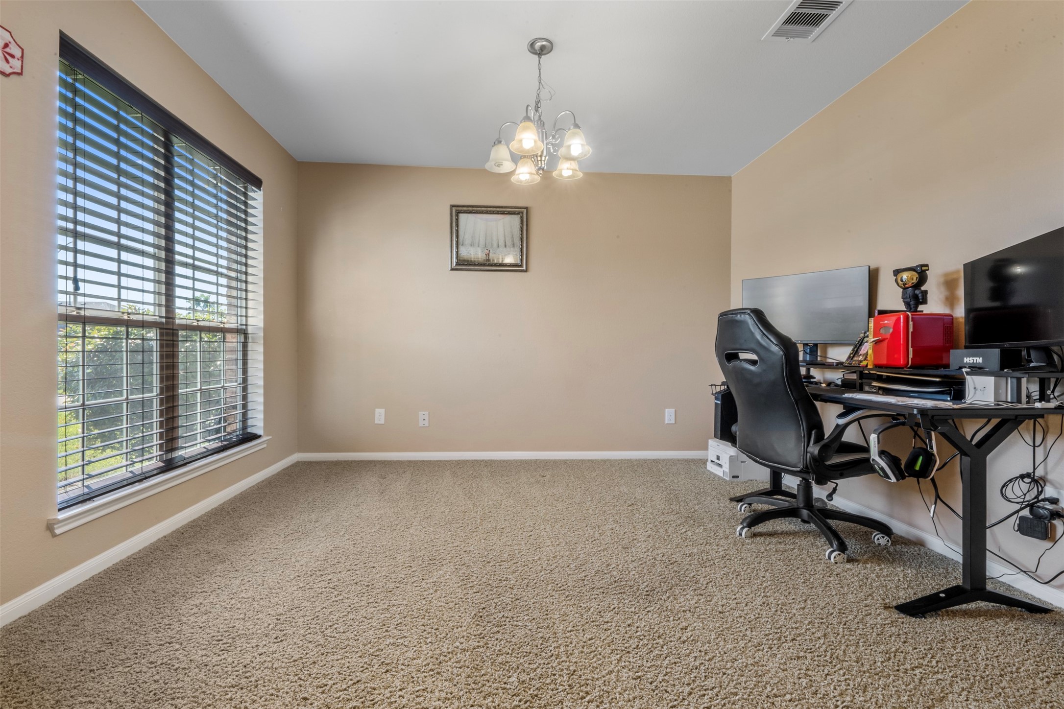 314 Gulf Winds Drive Bacliff, TX 77518 - Photo 4 of 24 a view of a workspace with furniture and a window