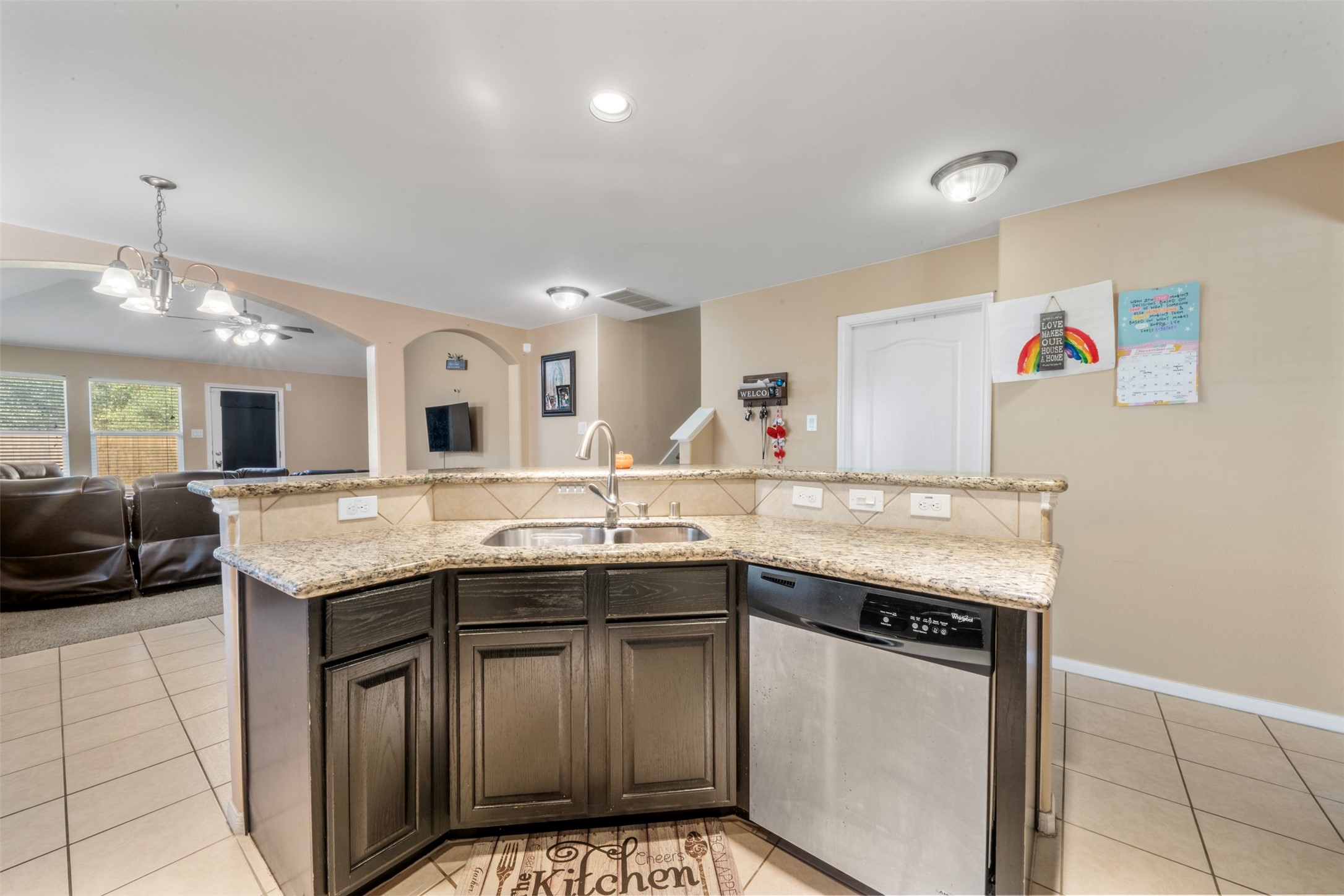 314 Gulf Winds Drive Bacliff, TX 77518 - Photo 7 of 24 a kitchen with a sink and a stove top oven