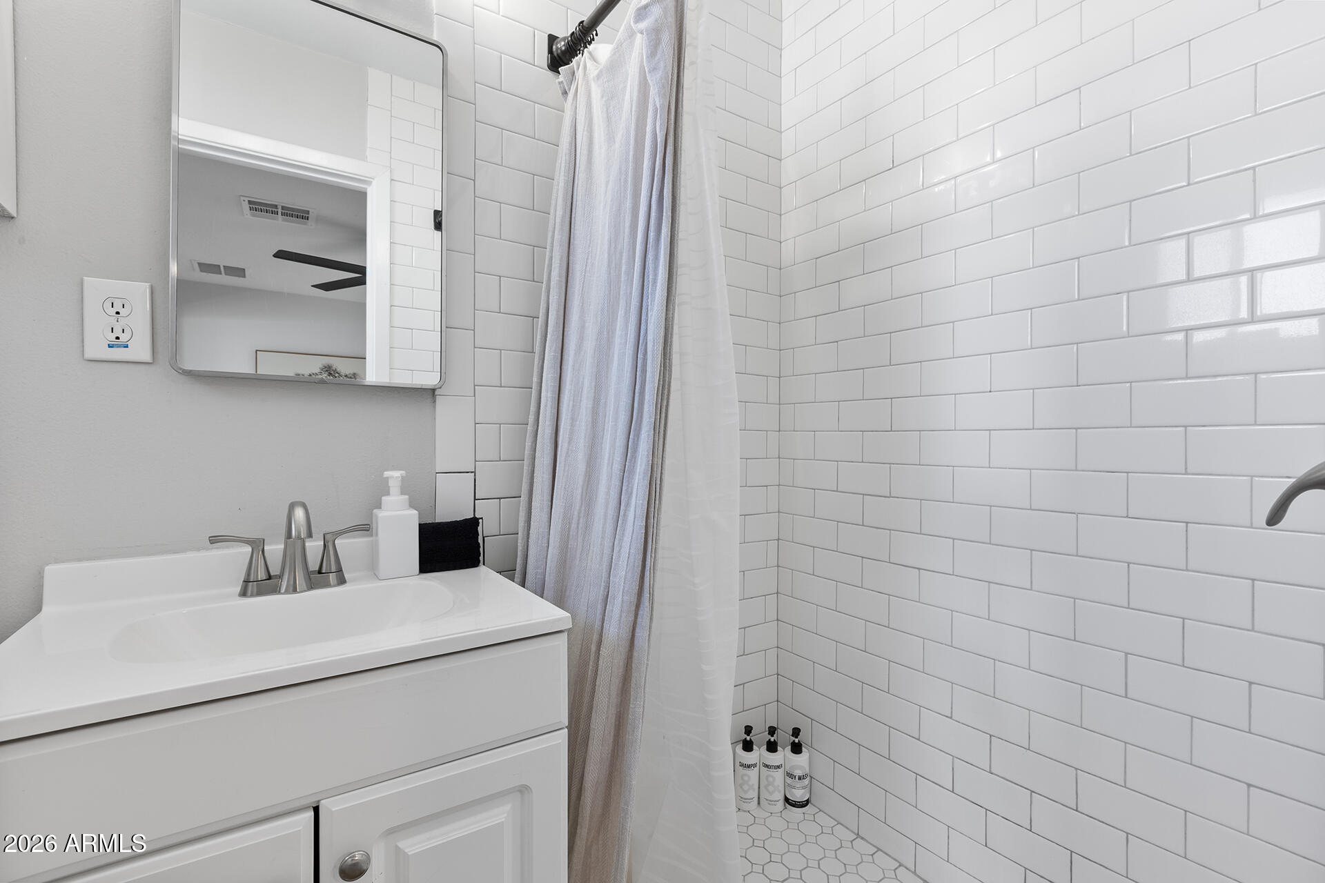 726 West 19th Street Tempe, AZ 85281 - Photo 18 of 40 a bathroom with a sink and a mirror
