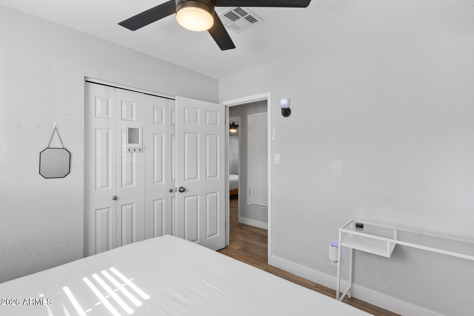 726 West 19th Street Tempe, AZ 85281 - Photo 22 of 40 a bedroom with a bed and cabinets