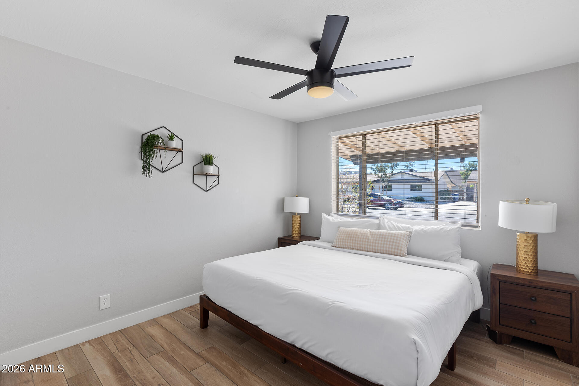 726 West 19th Street Tempe, AZ 85281 - Photo 27 of 40 a bedroom with a bed and a window