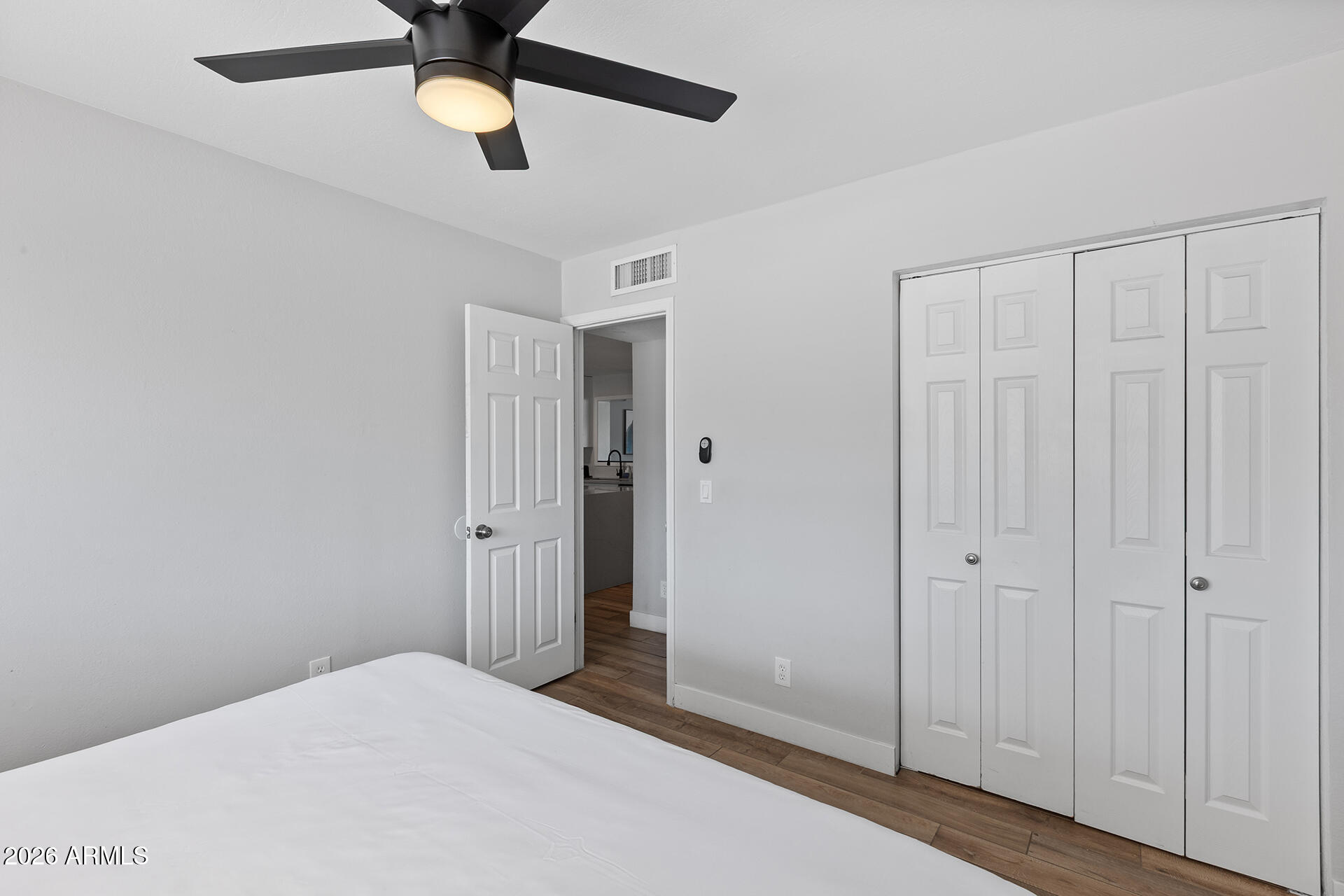 726 West 19th Street Tempe, AZ 85281 - Photo 28 of 40 a bedroom with a bed and a chandelier fan
