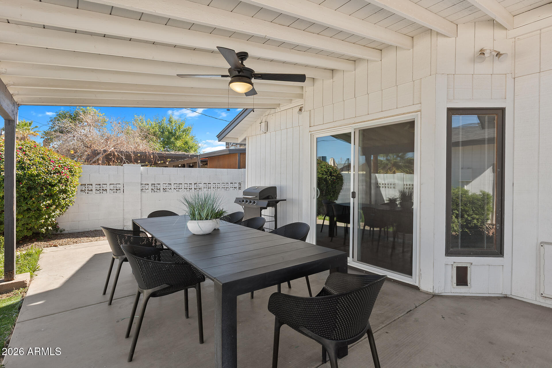 726 West 19th Street Tempe, AZ 85281 - Photo 34 of 40 a view of a dining room with furniture window and outside view