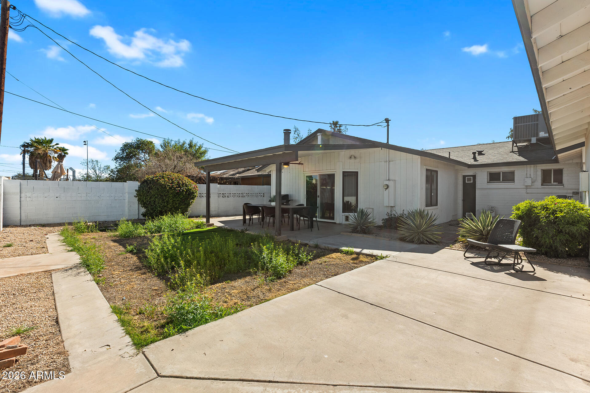 726 West 19th Street Tempe, AZ 85281 - Photo 37 of 40 a front view of a house with a yard