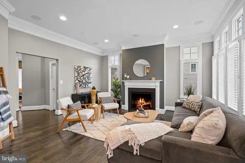 a bath tub sitting next to a window