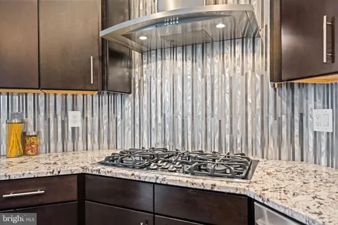 a view of a room with wooden walls