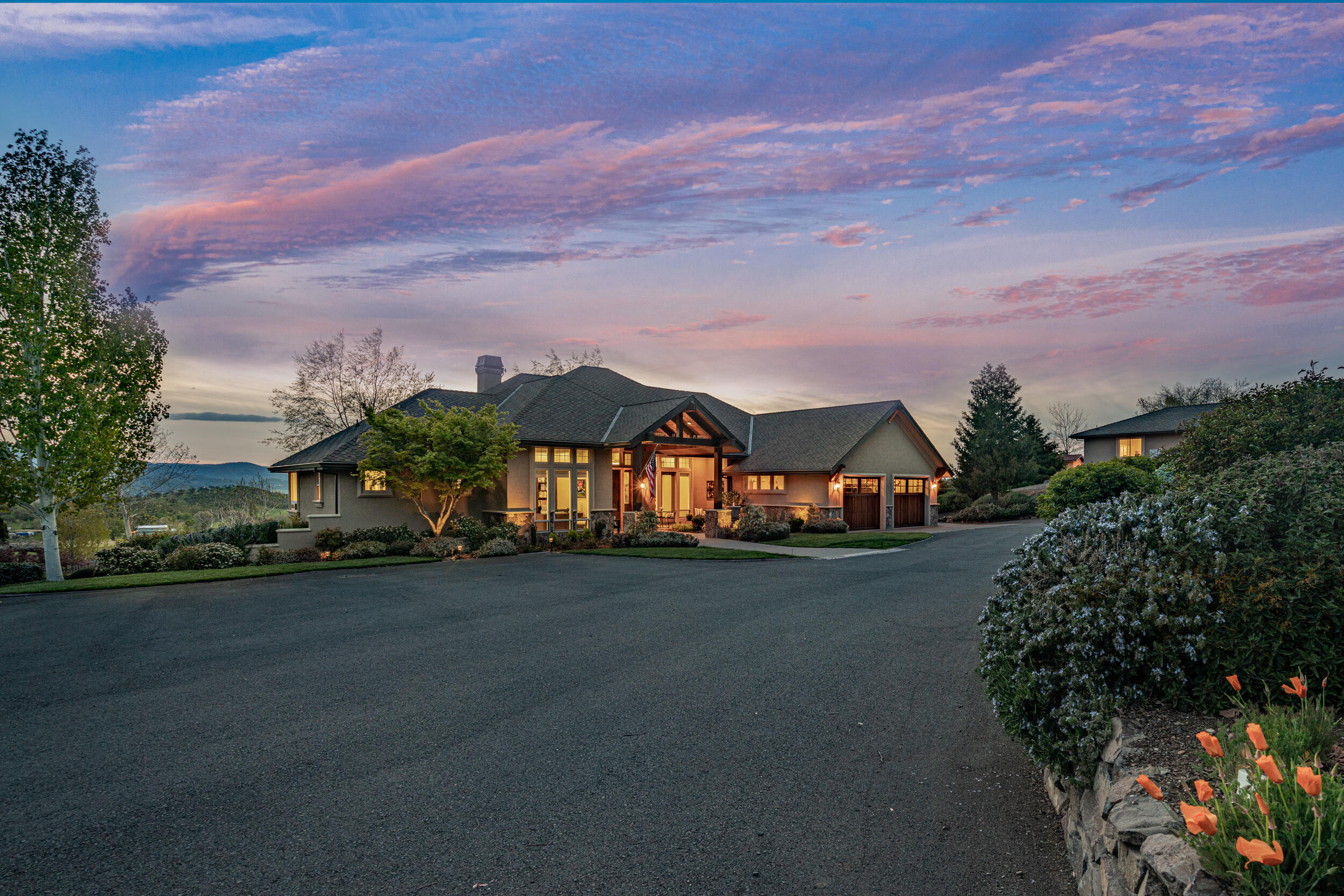 5709 Hughes Road Medford, OR 97504 - Photo 43 of 70 a view of a street with a building in the background