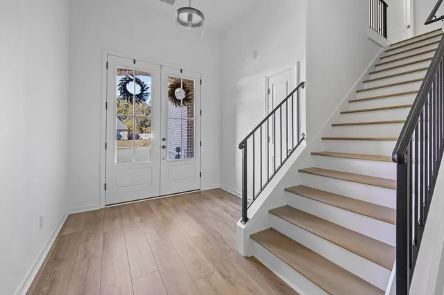 a view of entryway with wooden floor