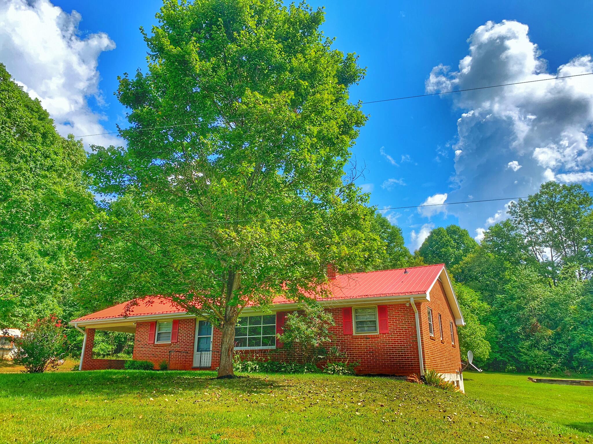 5260 Haw Patch Road Ferrum, VA 24088 - Photo 1 of 46 a view of a house with a backyard