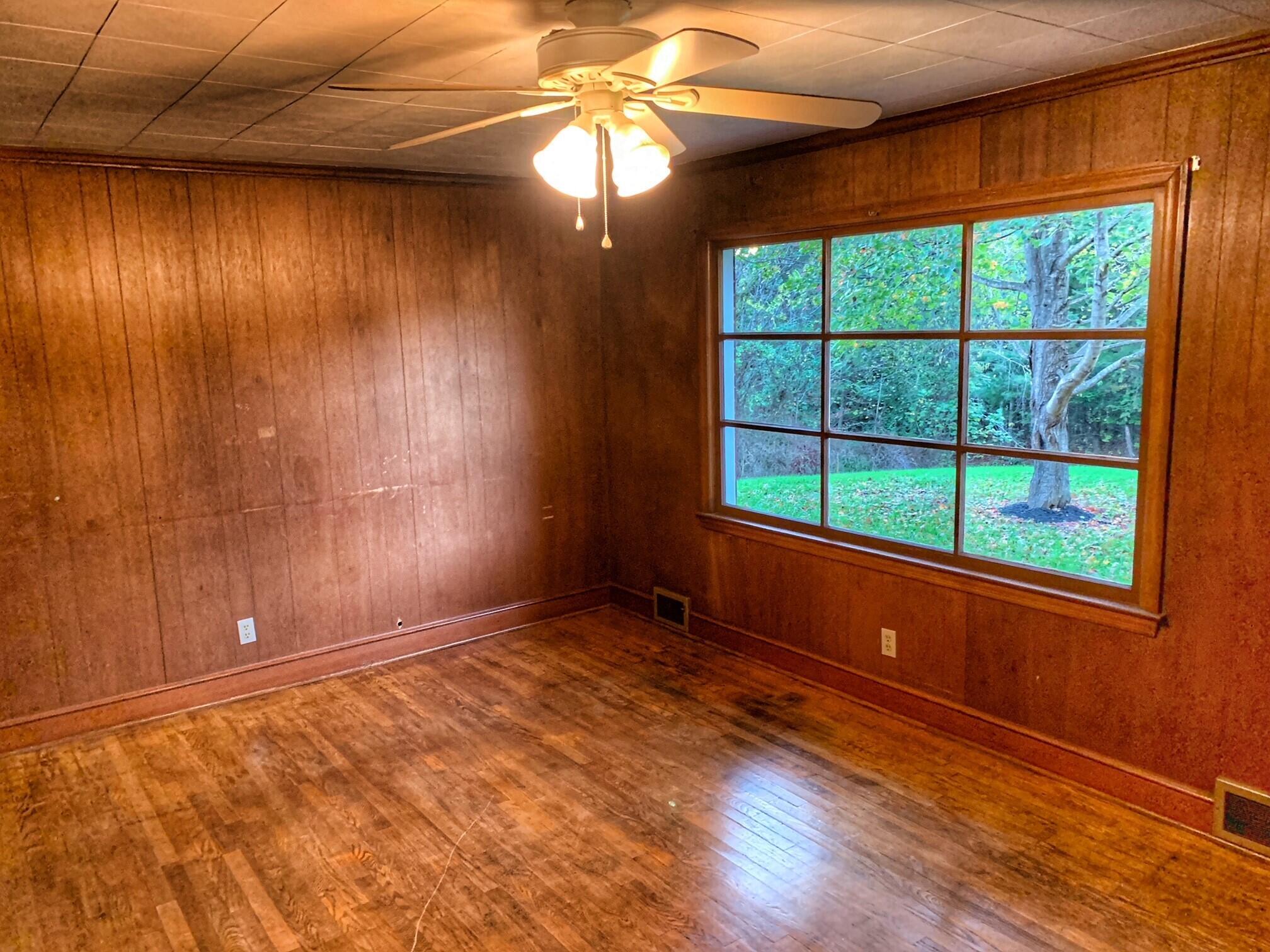 5260 Haw Patch Road Ferrum, VA 24088 - Photo 17 of 46 an empty room with windows and closet