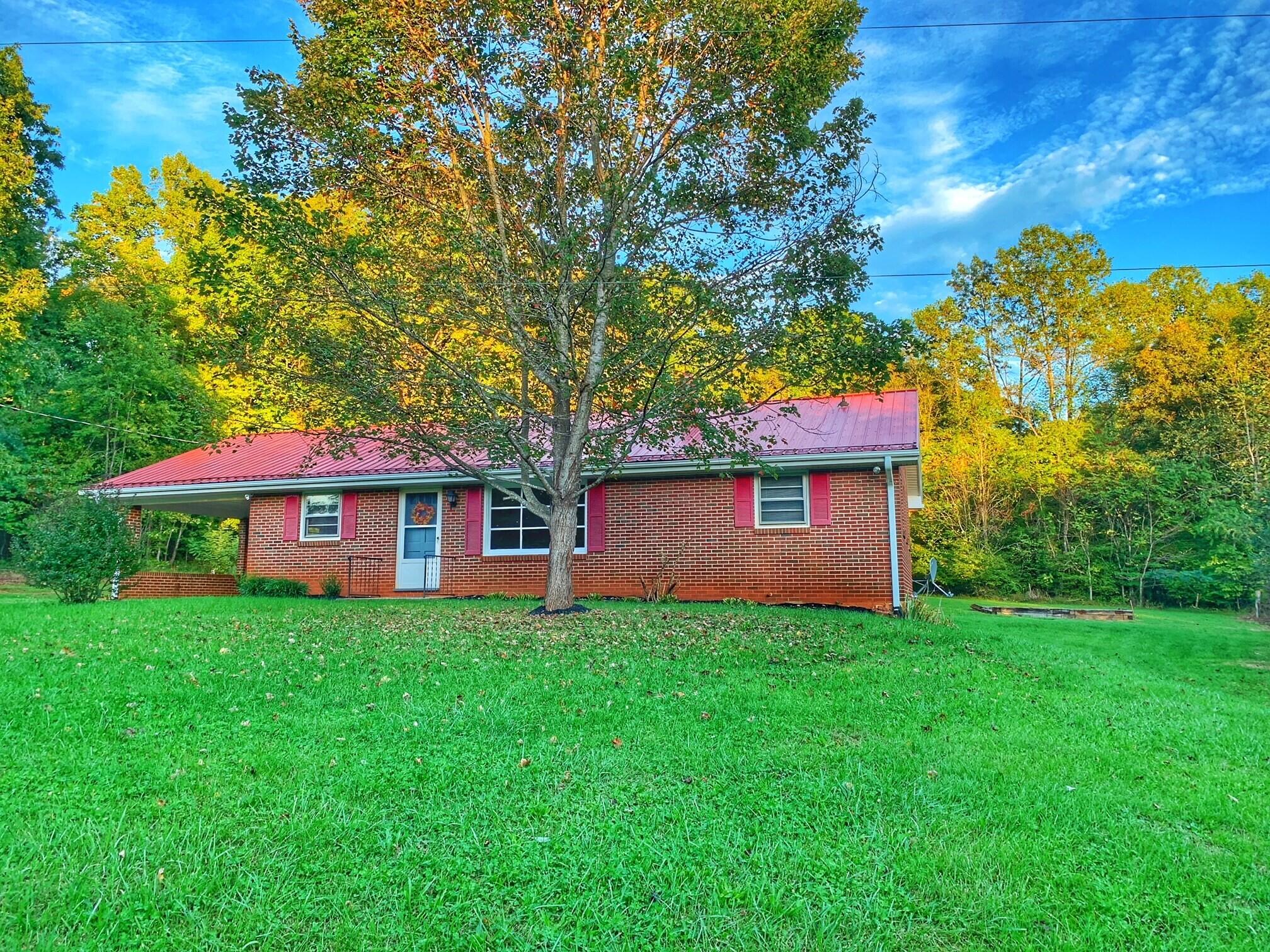 5260 Haw Patch Road Ferrum, VA 24088 - Photo 5 of 46 a view of a house with a yard