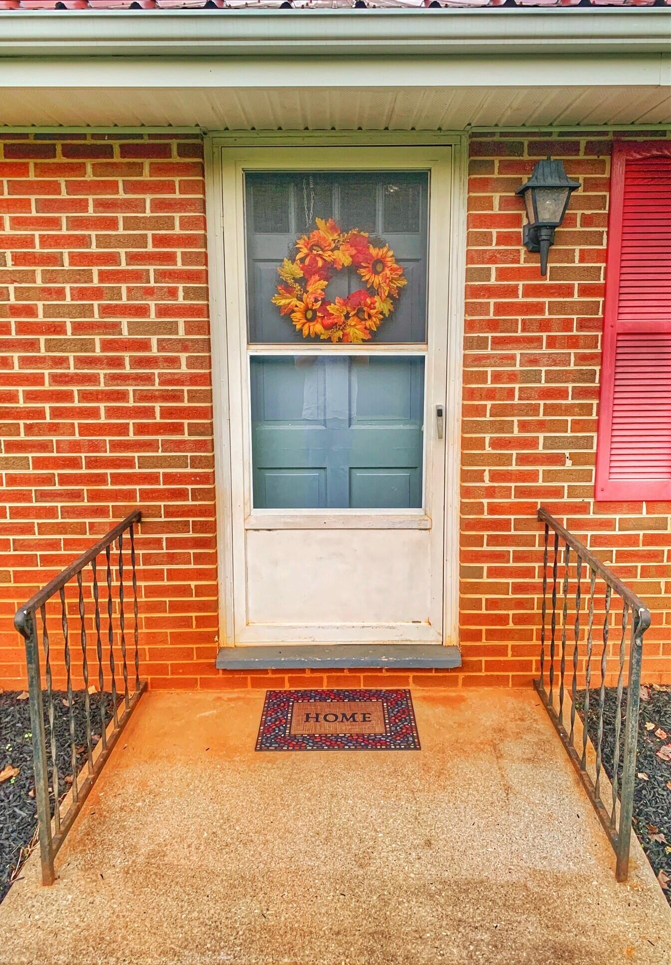 5260 Haw Patch Road Ferrum, VA 24088 - Photo 10 of 46 a view of entrance door of the house