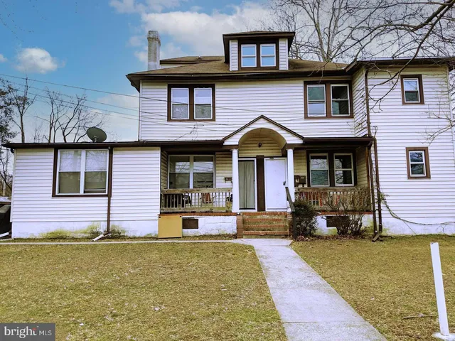 a front view of a house having yard