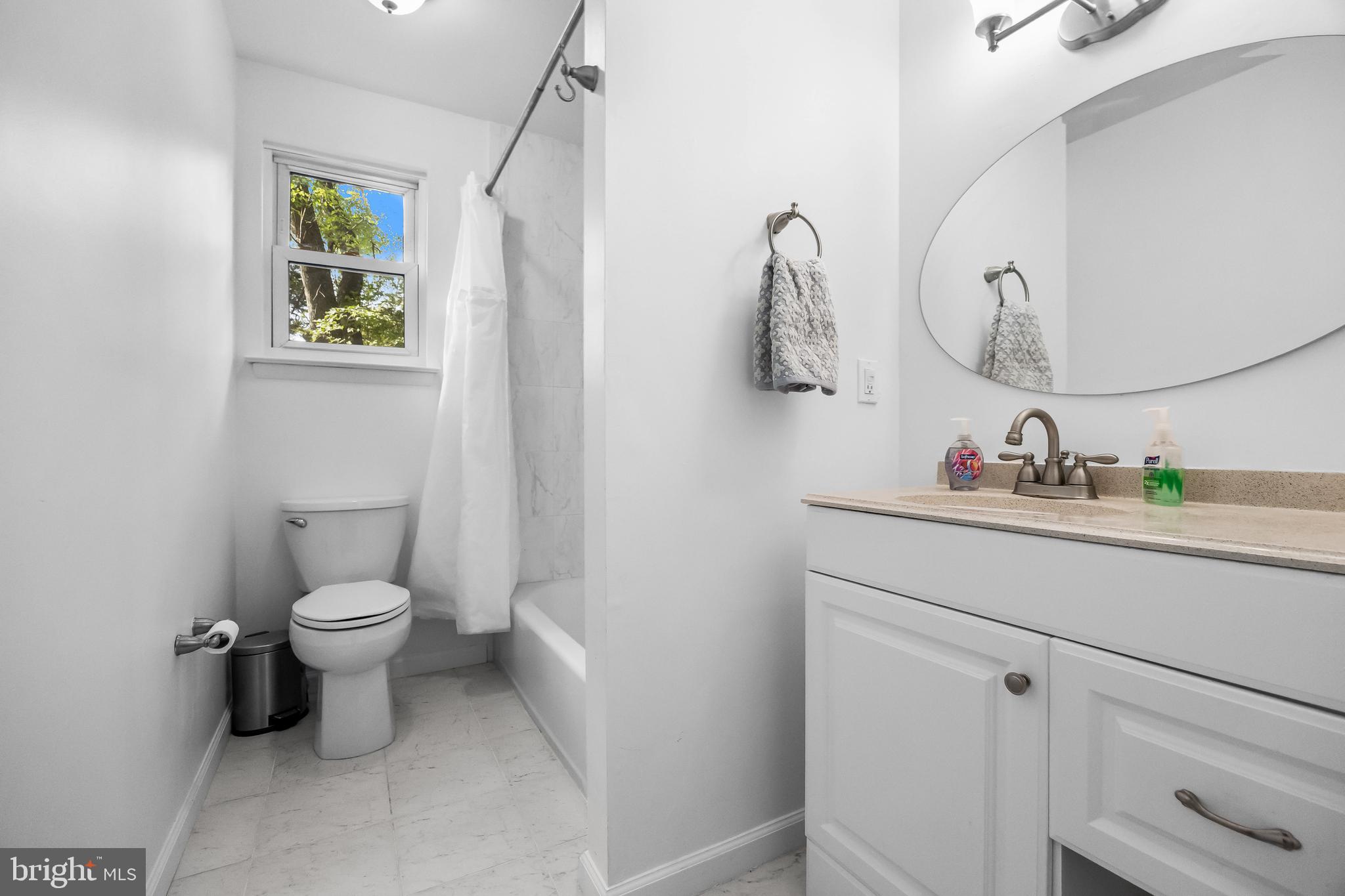 145 Tuckerton Road Shamong, NJ 08088 - Photo 6 of 19 a bathroom with a toilet a sink and mirror