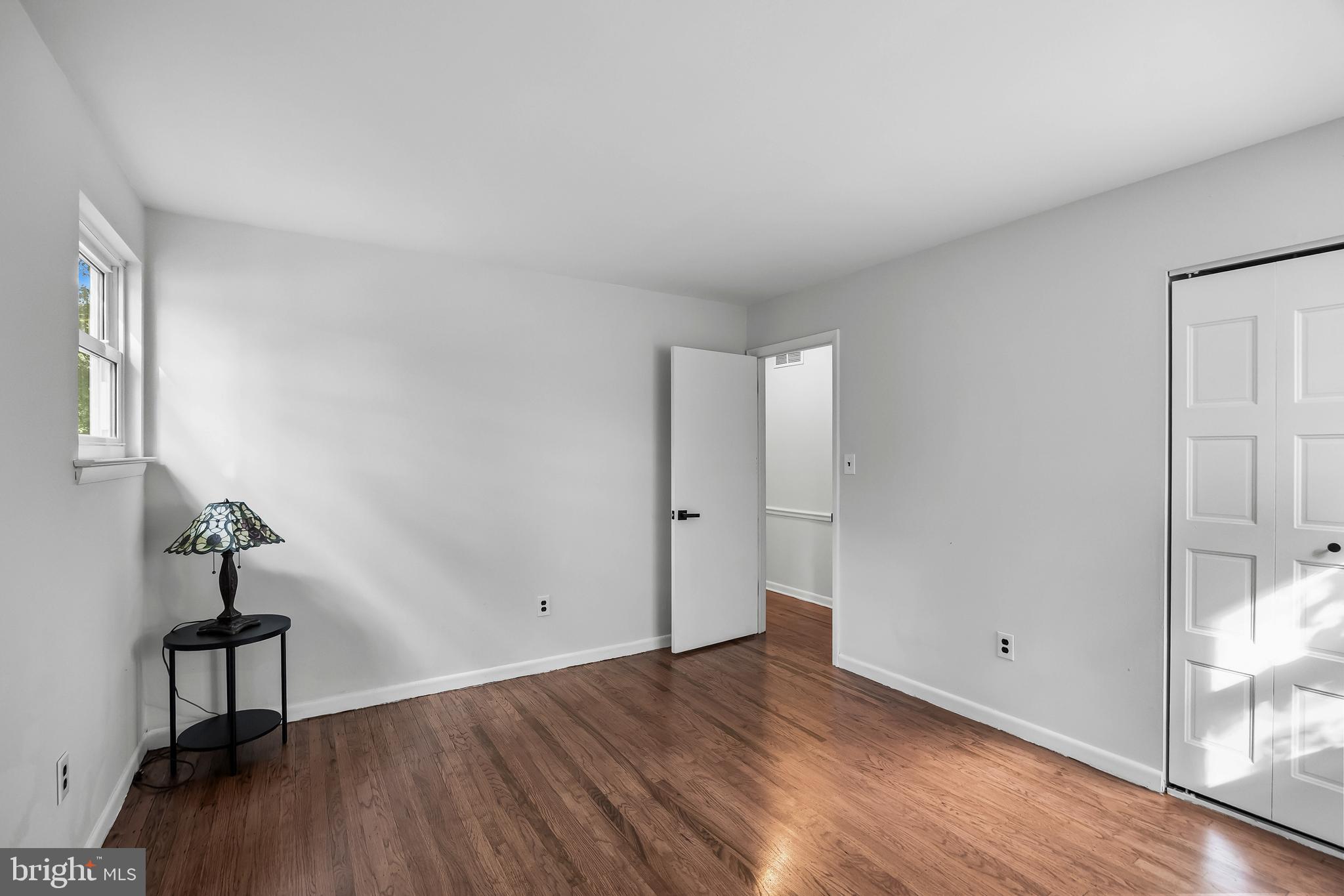 145 Tuckerton Road Shamong, NJ 08088 - Photo 8 of 19 a view of a room with wooden floor and a window