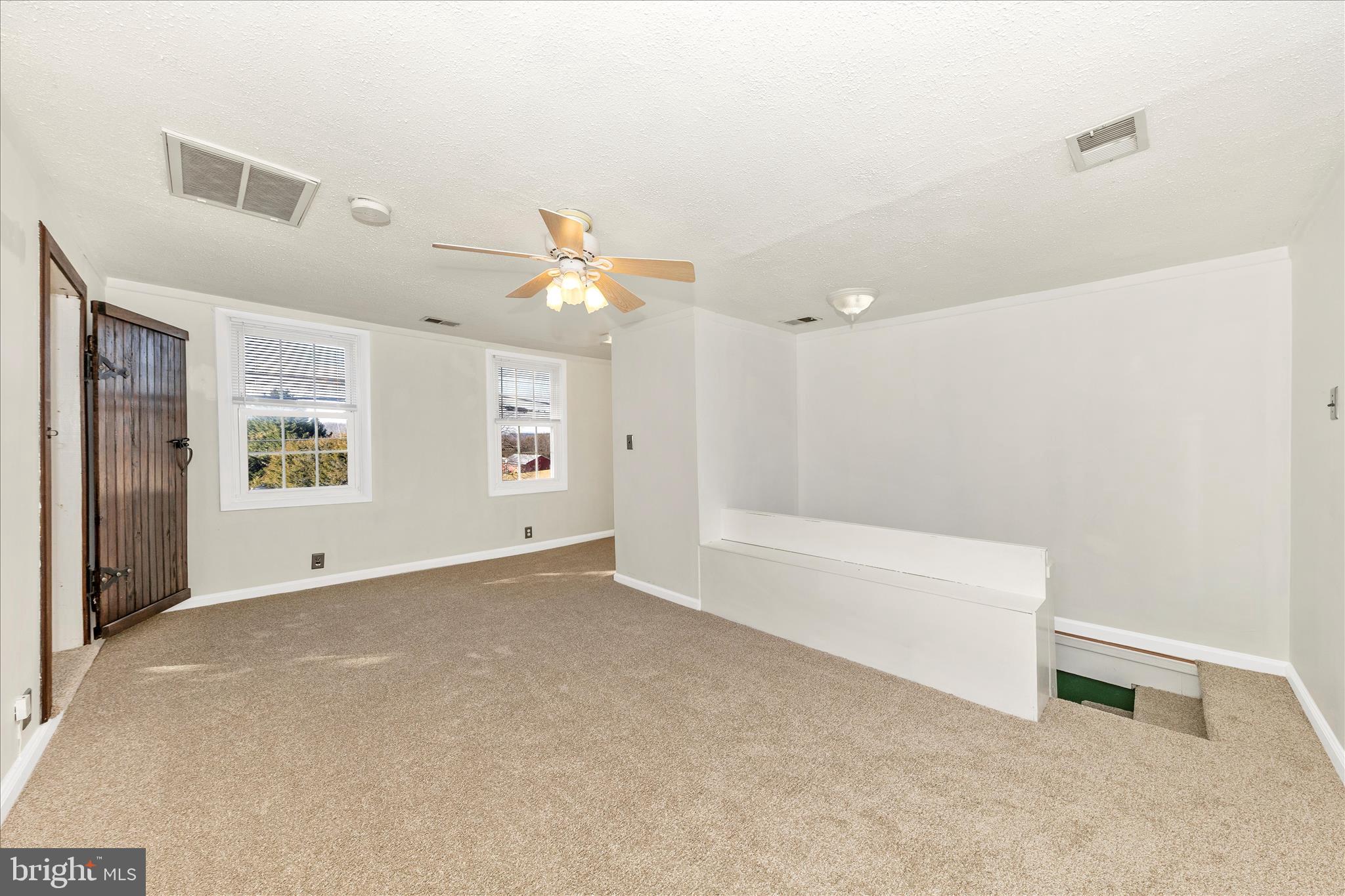 8204 Ball Road Frederick, MD 21704 - Photo 27 of 55 a view of an empty room with a window