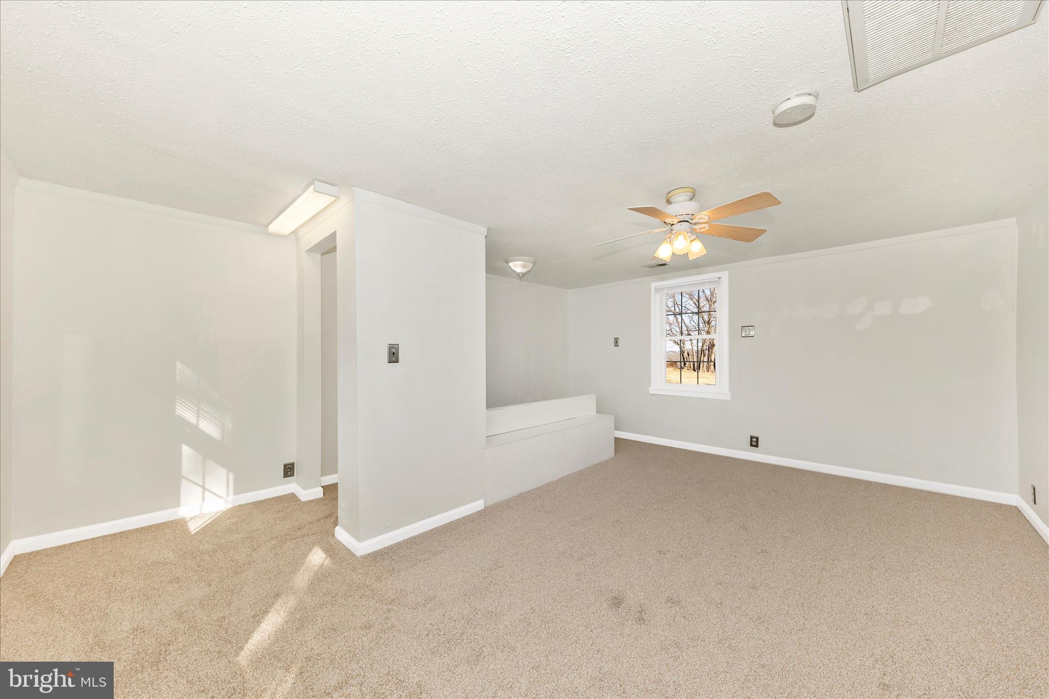 8204 Ball Road Frederick, MD 21704 - Photo 28 of 55 an empty room with a empty space and windows