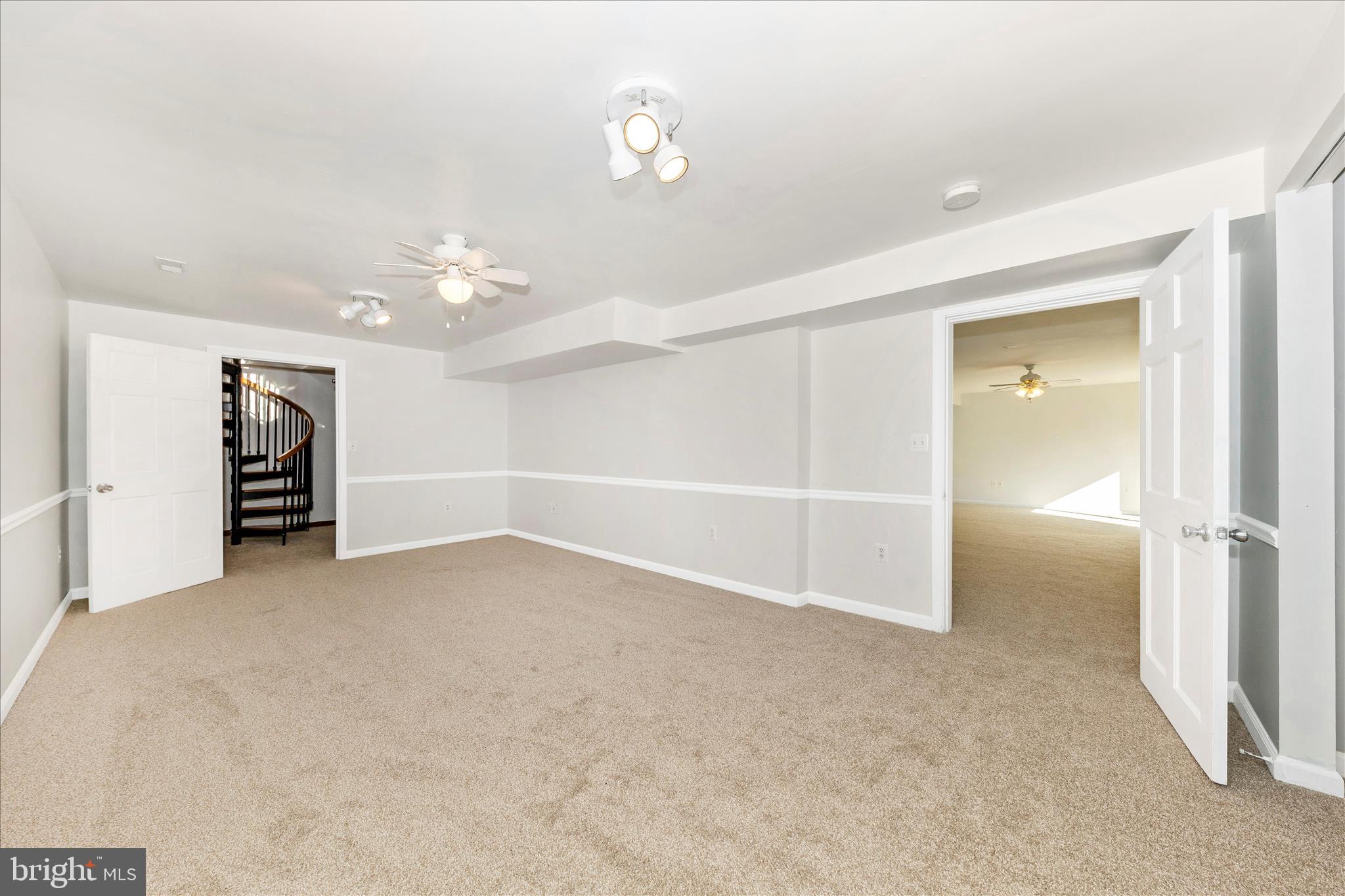 8204 Ball Road Frederick, MD 21704 - Photo 33 of 55 an empty room with closet and a ceiling fan
