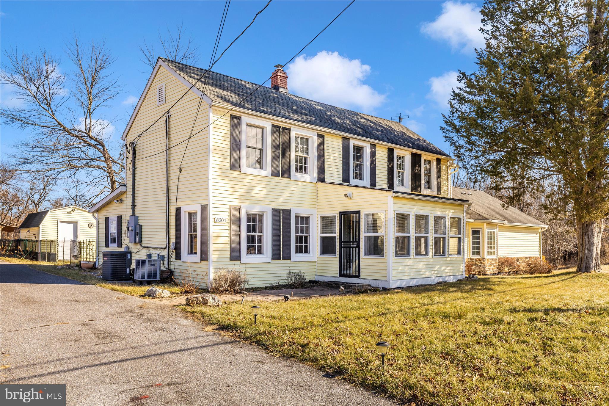 8204 Ball Road Frederick, MD 21704 - Photo 38 of 55 a front view of a house with a yard