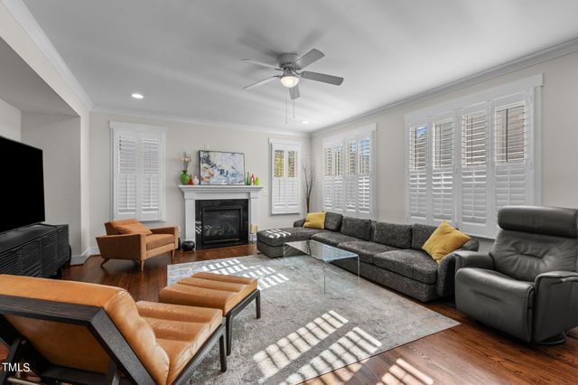 a spacious bedroom with a bed and a couch