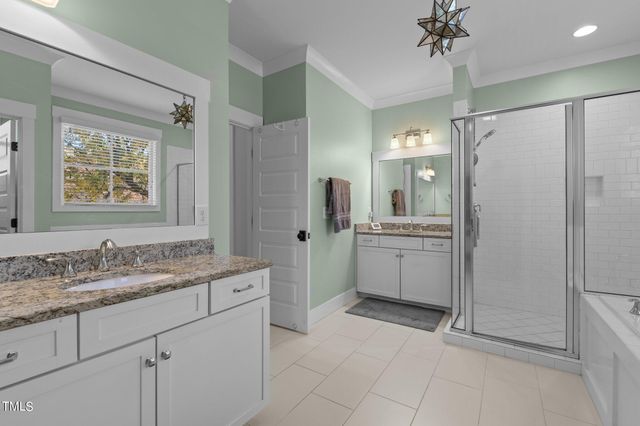 a room with gym equipment and windows