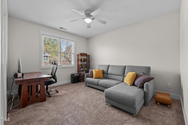 a front view of a house with a porch