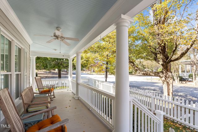 a view of a building with a street light board