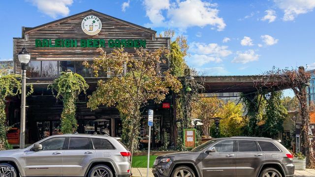 a view of a food mall next to a road