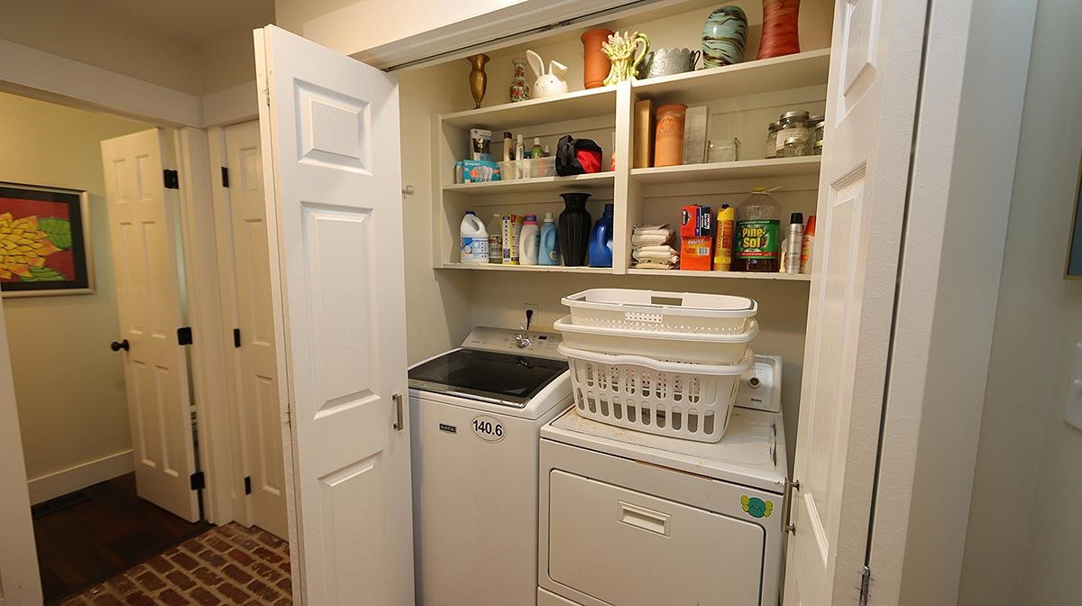 2013 Torrington Street Raleigh, NC 27615 - Photo 13 of 25 Mud Room area with half bath access and laundry. Mud Room