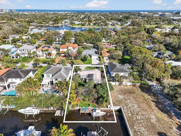 an aerial view of residential building with parking space