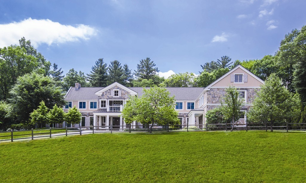 4 Summit Road Weston, MA 02493 - Photo 2 of 30 a front view of a house with a garden