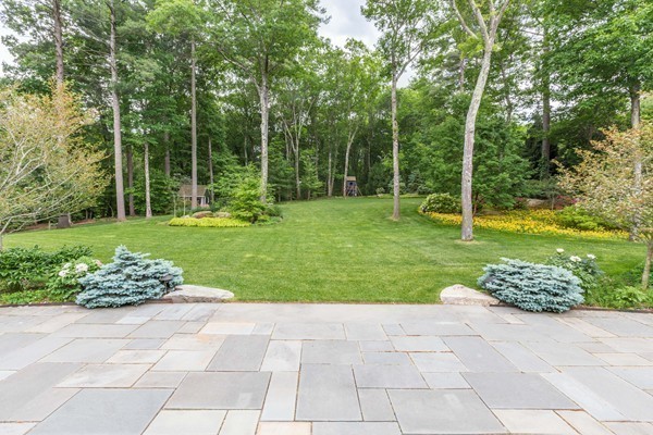 4 Summit Road Weston, MA 02493 - Photo 22 of 30 a view of a garden with a chair