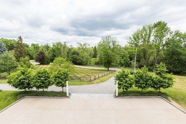 4 Summit Road Weston, MA 02493 - Photo 5 of 30 a view of a garden with plants