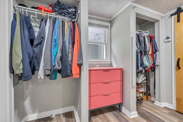 a bathroom with a toilet sink and a window