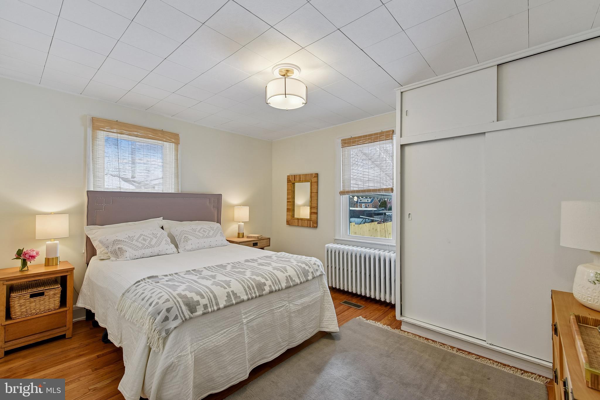 100 Margaret Avenue Baltimore, MD 21221 - Photo 15 of 44 a bedroom with a bed and a window
