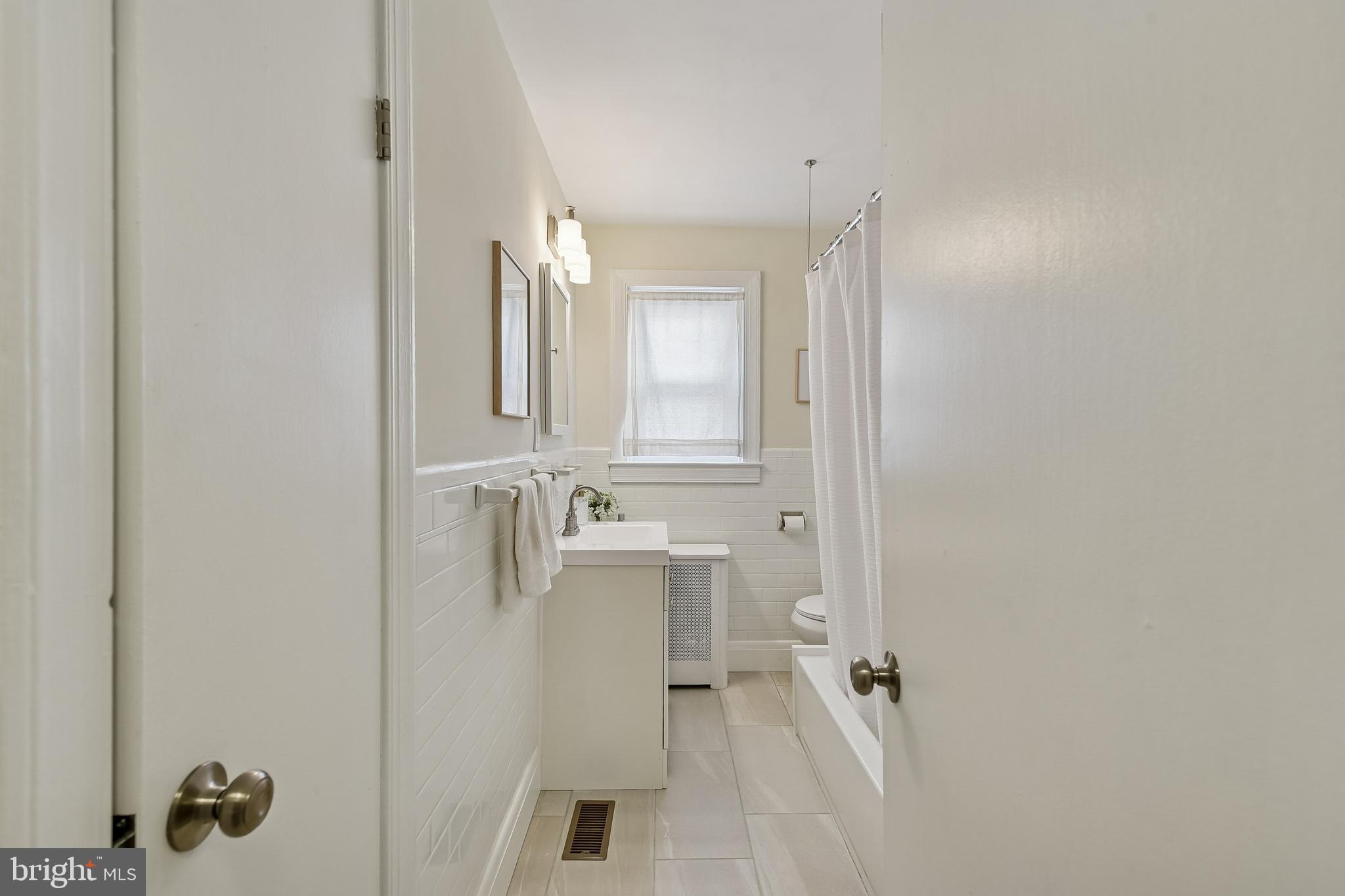 100 Margaret Avenue Baltimore, MD 21221 - Photo 18 of 44 wooden floor in a bathroom