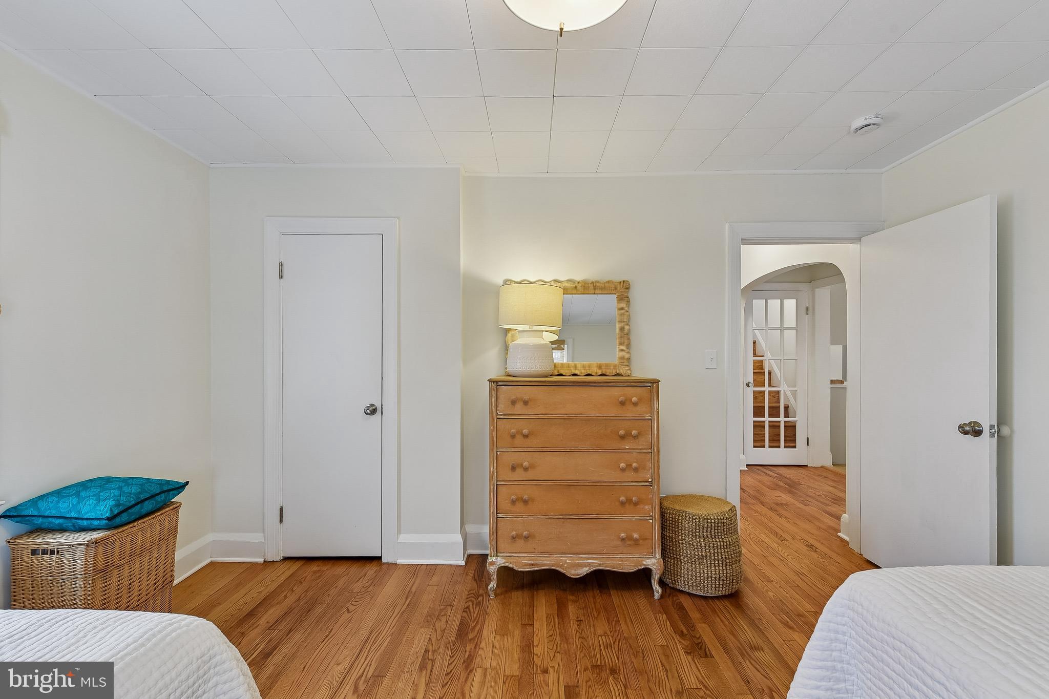 100 Margaret Avenue Baltimore, MD 21221 - Photo 20 of 44 a bedroom with a bed and wooden floor
